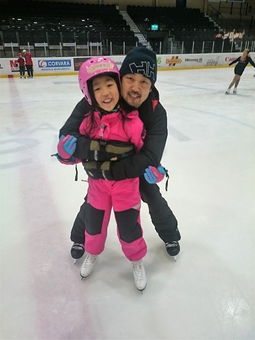 久山さんのご主人と娘さんの写真